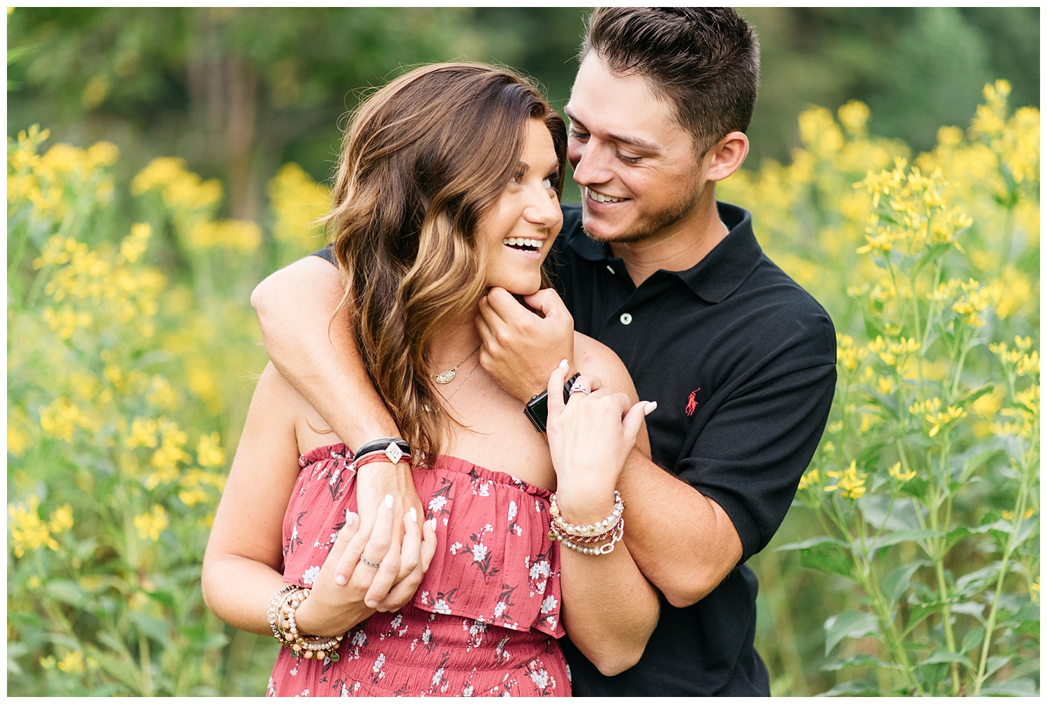 fisher farm engagement photo with flowers