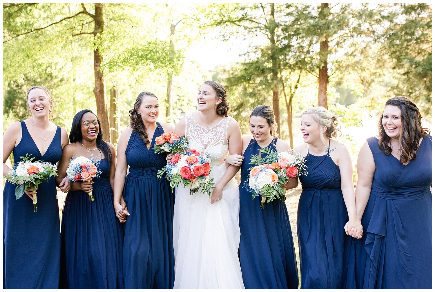fun bridesmaids in navy blue